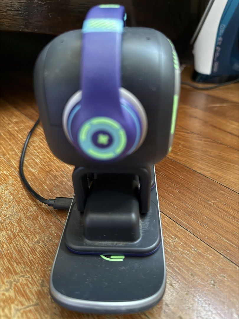 Emo Robot (Category: Interactive Toys) located in Singapore. Submitted by nash_zeya_fox (Listing ID 1453058009, Image 2). Description: - EMO Robot - Includes charging dock and skateboard base - Features headphones and expressive screen - Interactive and fun Bought this for 499.