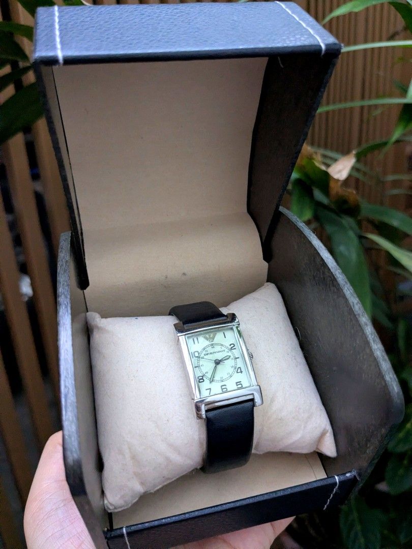 Emporio Armani Exchange AR 211 Rectangular Tank Style Leather Watch (Category: Luxury Watches) located in Quezon City. Submitted by nnncorner (Listing ID 1453183029, Image 2). Description: Emporio Armani Exchange Rectangular Tank Style Leather Watch 100% Original Unisex 50 ATM WATER RESISTANT 100% Genuine Leather Strap All parts are original 8.9/10 overall condition 1 inch glass face size fits 15-20 cm wrist only (adjustable) no issues, just not 