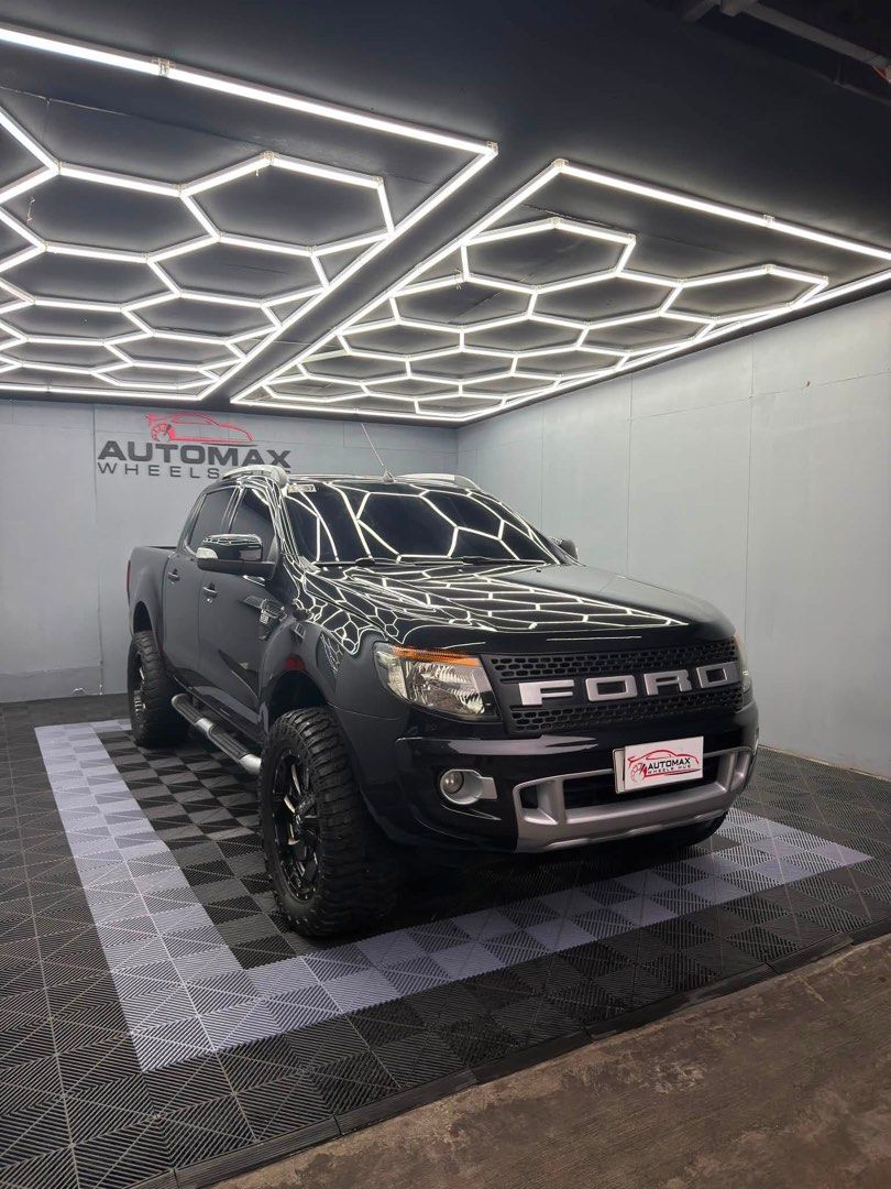 Ford Ranger DBL 3.2L 4x4 Auto (Category: Used Cars) located in Quezon City. Submitted by automax1120 (Listing ID 1431262570, Image 3). Description: 2014 FORD RANGER DBL 3.2L AT 4x4 💰 ₱628,000 (Negotiable upon actual viewing) Vehicle Details: • Automatic Transmission • Diesel Engine | 3.2L • 4x4 | 1st Owner • Full Casa Maintain | Very Good Condition • All Original | Ending Plate #8 Available Payment Options: • Cash • Trade-In • Bank Financing (✅ 