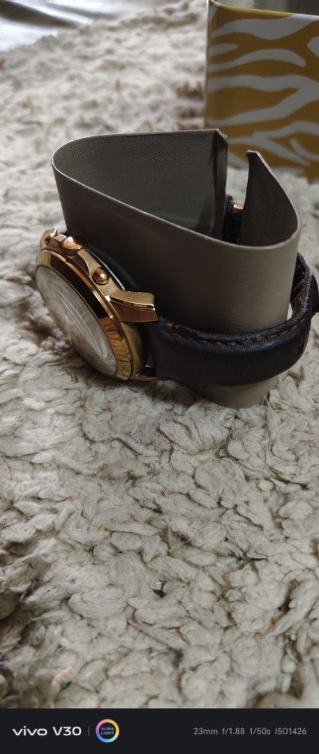 Fossil Rose Gold Chronograph Watch with Leather Strap (Category: Women's Watches) located in Manila. Submitted by roblazo25 (Listing ID 1453234092, Image 3). Description: - Rose gold case Fossil watch - White dial with Roman numerals - Chronograph function - Dark brown leather strap - Includes original Fossil tin box with tiger design - Ideal for everyday use or as a gift -issue gasgas sa back case.