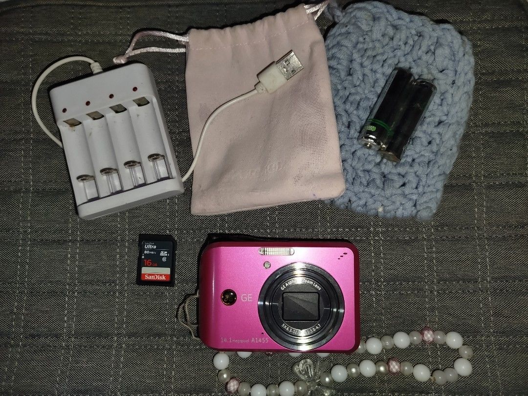 📢NEGOTIABLE! GE A1455 (Category: Cameras) located in Lucena. Submitted by faayemcrg (Listing ID 1453194011, Image 2). Description: No issue! - Compact point-and-shoot digital camera - 14.1 megapixels - 5x optical zoom lens - 2.7-inch LCD screen - Rare Pink Color Free: Camera Case (2) Beaded Strap AA Batteries Battery Charger San Disk 16 GB SD Card Card Reader (not included in the photo) DM for sample shots and infos.