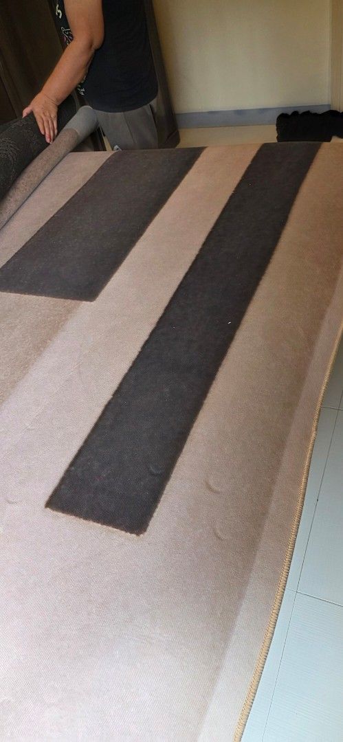 Geometric Stripe Rug - Beige and Dark Grey (Category: Carpets, Mats & Flooring) located in Manila. Submitted by cher0918 (Listing ID 1453159909, Image 1). Description: big carpet -Modern geometric stripe design - Alternating beige and dark grey bands - Soft and durable texture - Ideal for living rooms or bedrooms - dimension 59x79.