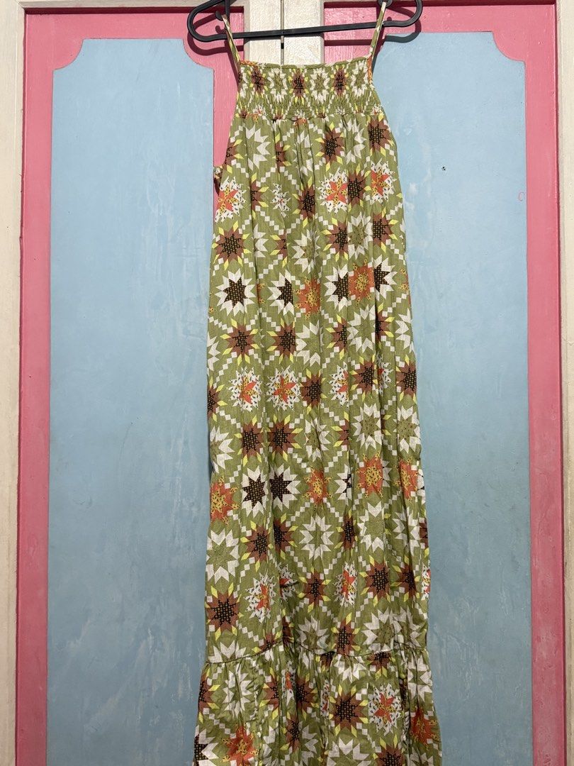 Green Floral Print Dress (Category: Dresses) located in Manila. Submitted by prelovedbyshai_116 (Listing ID 1453141749, Image 1). Description: - Eye-catching green dress with a vibrant geometric and floral print. - Made from 100% breathable cotton with added elastic for comfort. - Features a tag made from 100% recycled plastic..
