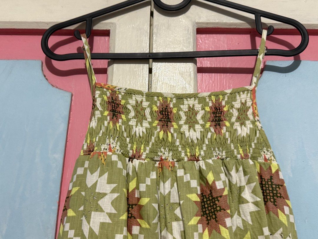 Green Floral Print Dress (Category: Dresses) located in Manila. Submitted by prelovedbyshai_116 (Listing ID 1453141749, Image 3). Description: - Eye-catching green dress with a vibrant geometric and floral print. - Made from 100% breathable cotton with added elastic for comfort. - Features a tag made from 100% recycled plastic..