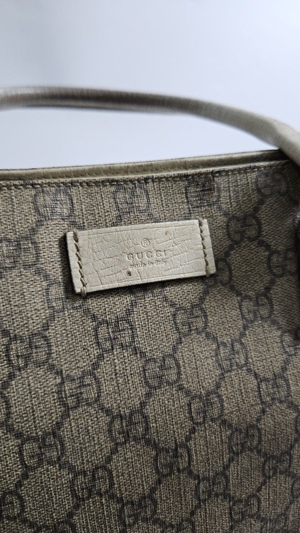 Project bag Gucci GG Monogram Tote Bag (Category: Luxury Bags & Wallets) located in Alfonso. Submitted by jbcamet (Listing ID 1453207742, Image 2). Description: - Authentic Gucci tote bag - Classic GG monogram canvas with leather trim - Interior zip and slip pockets - Magnetic snap closure.