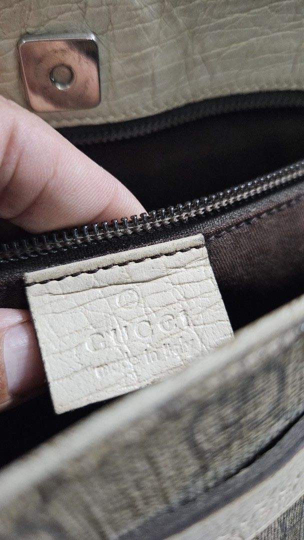 Project bag Gucci GG Monogram Tote Bag (Category: Luxury Bags & Wallets) located in Alfonso. Submitted by jbcamet (Listing ID 1453207742, Image 3). Description: - Authentic Gucci tote bag - Classic GG monogram canvas with leather trim - Interior zip and slip pockets - Magnetic snap closure.