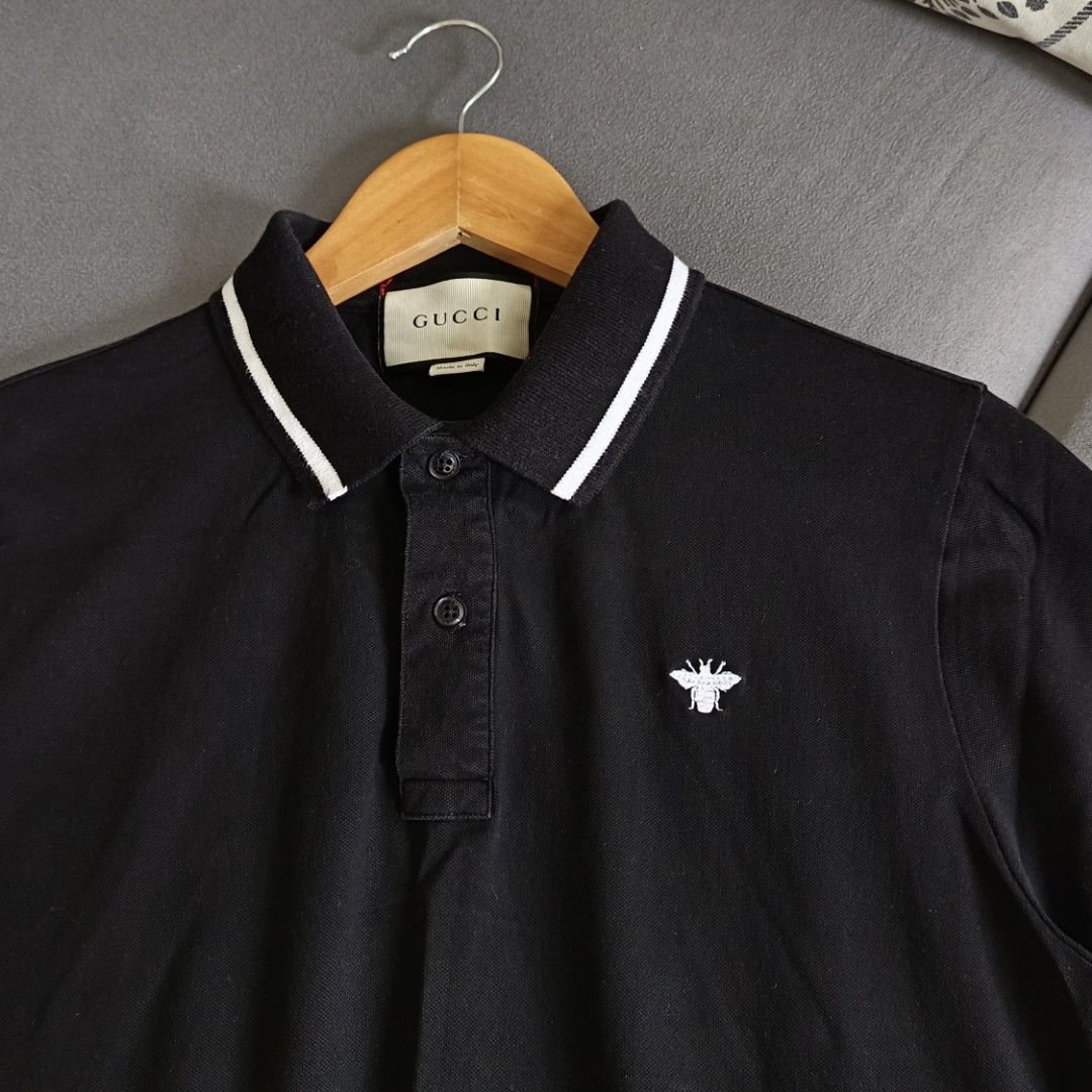 Gucci Polo Shirt (Category: Luxury Apparel) located in Banaue. Submitted by radical.thrift (Listing ID 1453198284, Image 2). Description: Gucci Embroidered Bee Logo Men's Polo Shirt •size xl on tag, best fit to medium (18.5W 26L) •9.5/10 condition & color rate ₱650 only.