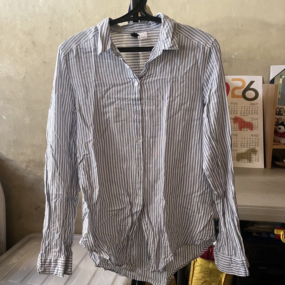 H&M Cotton Striped Button-Up Longsleeves (Category: Longsleeves) located in Manila. Submitted by mailed (Listing ID 1453060696, Image 1). Description: - Classic striped button-up shirt - Brand: Divided by H&M - Features: Long sleeves, collared neckline - XS-S.