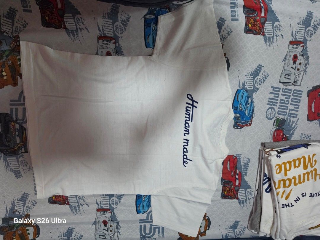 Human Made x Peanuts White Graphic T-Shirt (Category: Tshirts & Polo Shirts ) located in Iloilo. Submitted by badjersen69 (Listing ID 1453179827, Image 2). Description: - Brand: Human Made - Collaboration: Peanuts - Not Thrifted - Used twice only - Color: White - Size: M (21×27) - Material: 100% Cotton - Features: Front Joe Cool graphic, embroidered Human Made logo on back - Style: Casual, comfortable.