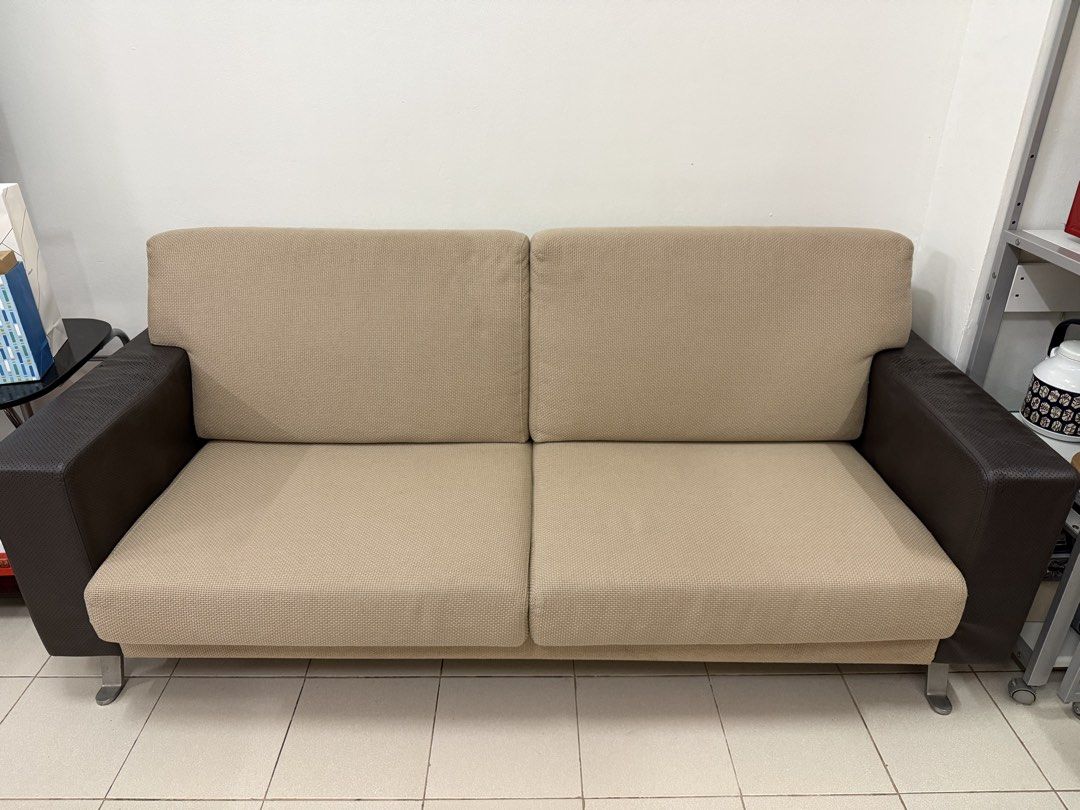 iloom Cubis 3-Seater Sofa (Category: Sofas) located in Manila. Submitted by jcbagio20 (Listing ID 1453201302, Image 1). Description: Selling an authentic iloom Cubis (HCS070X) 3-seater sofa featuring beige textured fabric cushions, dark brown perforated leatherette armrests, and sturdy metallic legs. Dimensions Overall (W x D x H): 76.4” x 33.5” x 33.5” Seat Height: 15.7” Key Details Materials: 85% Polyester / 15% Viscose fabric, synthetic leathe