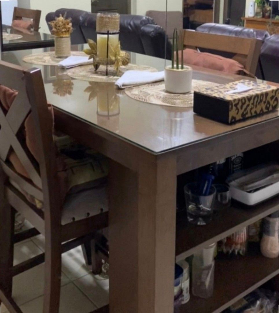 Imported Dining table & chairs (Category: Tables & Sets) located in Manila. Submitted by phoebecali (Listing ID 1453124120, Image 2). Description: Item : Impoted dining table & chairs Color : brown Condition : slightky used only. Almost new Inclusions : Dining counter table, 2 barstool chair , 2 stool.chair Front width - 59 inches Side width - 32 inches Ht - 36.2 inches i have indicated the shop price in the photo for your reference. Taguig area 