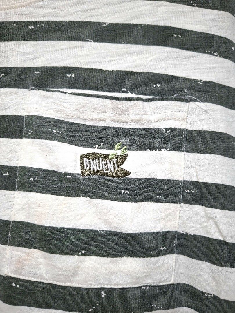 Jeep Striped Pocket T-Shirt (Category: Tshirts & Polo Shirts ) located in Batangas. Submitted by sell_ph (Listing ID 1453051245, Image 3). Description: - Authentic Jeep striped t-shirt - Features a chest pocket with embroidered Jeep logo - Jeep logo also printed on the front - Shows some light discoloration, particularly on the white stripes - Perfect for everyday casual wear.