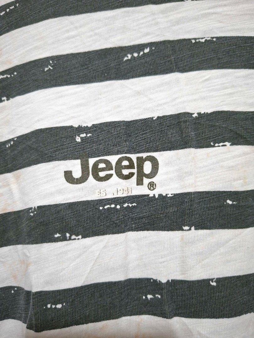 Jeep Striped Pocket T-Shirt (Category: Tshirts & Polo Shirts ) located in Batangas. Submitted by sell_ph (Listing ID 1453051245, Image 2). Description: - Authentic Jeep striped t-shirt - Features a chest pocket with embroidered Jeep logo - Jeep logo also printed on the front - Shows some light discoloration, particularly on the white stripes - Perfect for everyday casual wear.