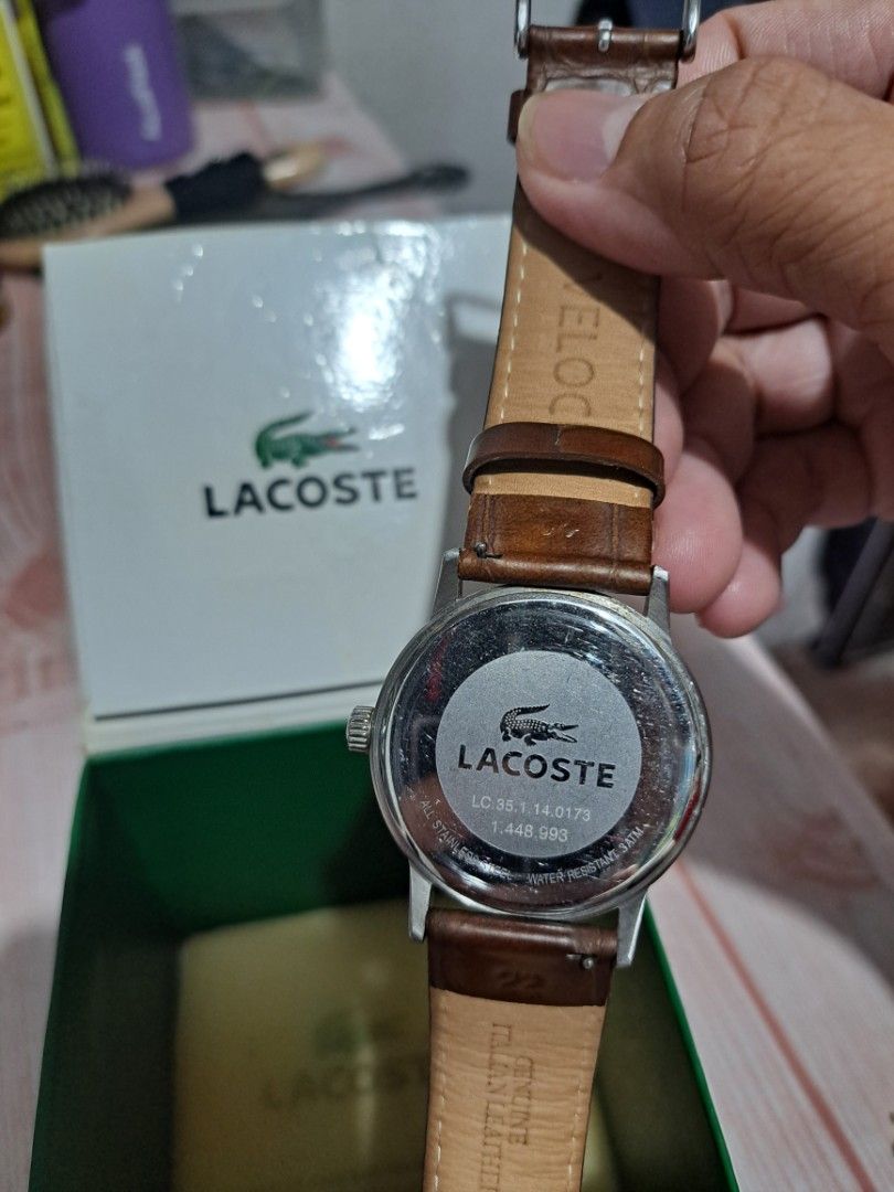 Lacoste Men's Watch Brown Leather Strap (Category: Men's Watches) located in Makati City. Submitted by lokaltisoy.1274 (Listing ID 1453195248, Image 2). Description: - Authentic Lacoste Watch - Model: LC 35.1.14.0173 - Dial: Dark Grey with Date Window - Strap: Genuine Brown Italian Leather (Replacement) - Case: Stainless Steel - Includes Original Lacoste Box.