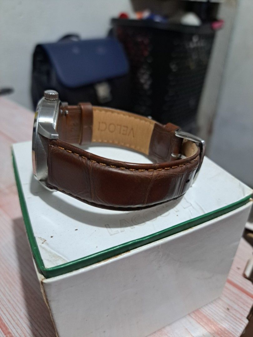 Lacoste Men's Watch Brown Leather Strap (Category: Men's Watches) located in Makati City. Submitted by lokaltisoy.1274 (Listing ID 1453195248, Image 3). Description: - Authentic Lacoste Watch - Model: LC 35.1.14.0173 - Dial: Dark Grey with Date Window - Strap: Genuine Brown Italian Leather (Replacement) - Case: Stainless Steel - Includes Original Lacoste Box.