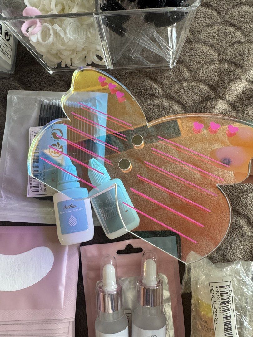Lash Tech Bundle (negotiable) (Category: Makeup) located in Manila. Submitted by prelovedsoso (Listing ID 1453135518, Image 3). Description: Selling for P900 only, negotiable 🤍 all items in pic estimated to be around 2k in total - under eye gel patches - 2pcs lash bonder, sealed - tool cleaner, sealed - spoolies - eyelash glue rings - gel remover & eyelash detergent - monochrome butterfly lash strip board - heart cleaning pads - mini q-tips 📍 o