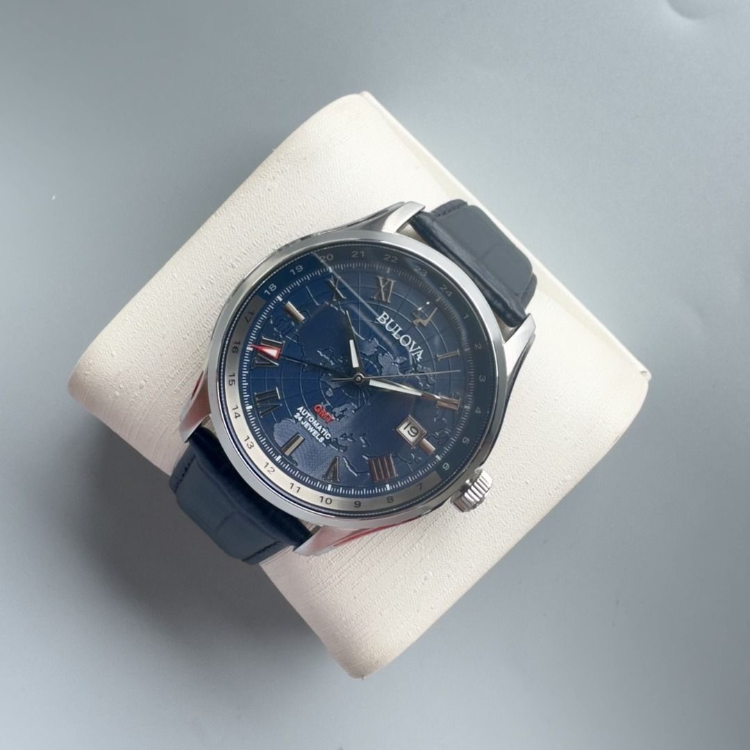 LNIB Bulova "Classic Wilton GMT" Automatic Watch (Category: Men's Watches) located in Manila. Submitted by twlph (Listing ID 1453055702, Image 2). Description: LNIB Bulova "Classic Wilton GMT" Automatic Watch - Can be rated 9.5/10, in very good condition. - Complete set. - 43mm case diameter. - Sapphire crystal. - Stainless steel case. - Black leather strap. - Blue dial with textured world map design. - 30m water resistance. - Caliber 9075 Japane