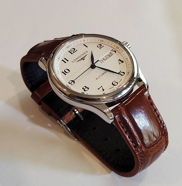 Longines Master Collection Day Date (Category: Luxury Watches) located in Baguio. Submitted by waistcoatgems (Listing ID 1439176827, Image 3). Description: Stunning Master Collection Day Date with Genuine Swiss Eta2836-2 movement. Fully serviced and working as it should. "Not Made By Longines" 39.5mm diameter with Genuine Alligator Strap. Watch is in Baguio City and shipping is included. Payment by Bank Transfer of PayPal..
