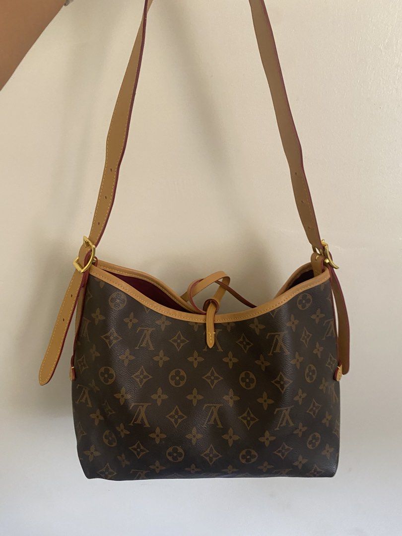 Louis Vuitton Monogram Canvas Shoulder Bag (Category: Luxury Bags & Wallets) located in Paete. Submitted by ladder_leynn (Listing ID 1453096523, Image 2). Description: -AUTHENTICITY NOT GUARANTEED - Classic Louis Vuitton shoulder bag in iconic Monogram canvas. - Features tan leather trim and straps. - Adjustable strap with gold buckle for a customized fit. - Secure drawstring closure. - Includes a detachable leather luggage tag with LV logo. - Li