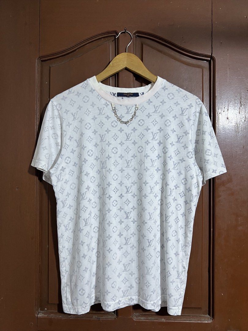 Louis Vuitton Monogram White Shirt (Category: Luxury Apparel) located in Manila. Submitted by thriftpoint99 (Listing ID 1453215077, Image 1). Description: 21x26 Issue pink fading on neck line and cut washtag Good condition .