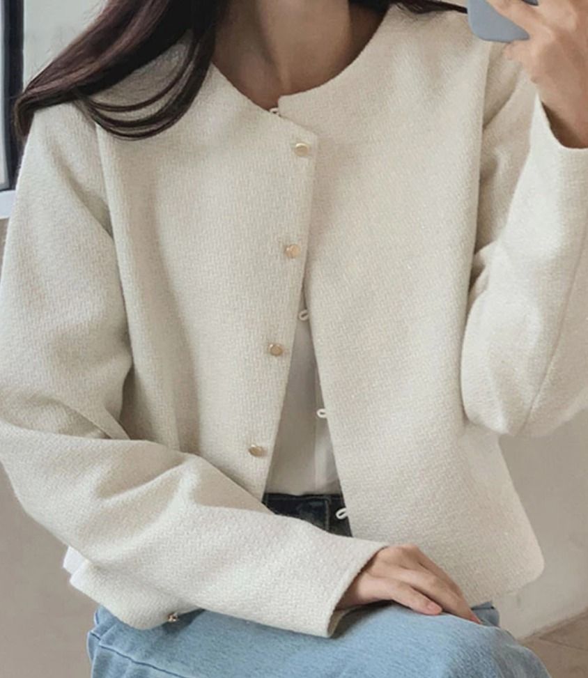Lovito White Tweed Button Up Cardigan Jacket (Category: Coats, Jackets and Outerwear) located in Cainta. Submitted by cqmpreloved (Listing ID 1453168439, Image 1). Description: - White tweed cardigan from Lovito - Features elegant gold button details - Estimated size M based on measurements - Perfect for layering over tops - Creates a chic smart casual look Original price is P600.
