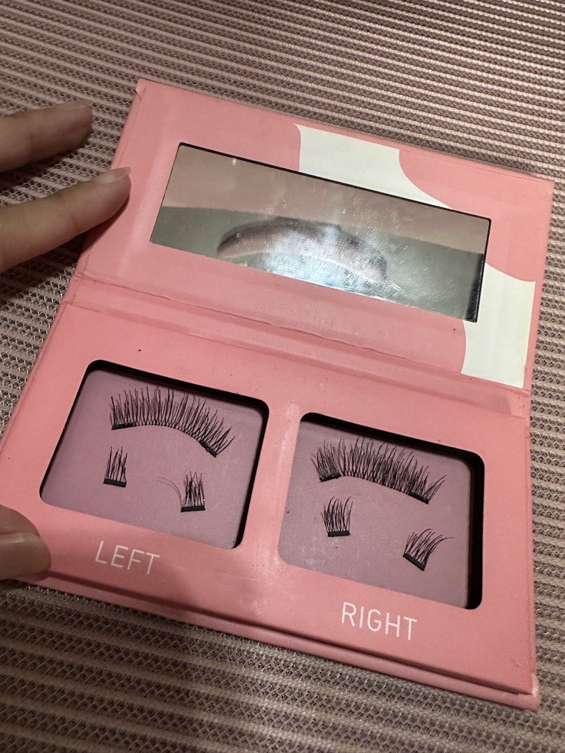 LUXX LASH Magnetic Lashes - Lily (Category: Makeup) located in Dasmarinas. Submitted by maecybee (Listing ID 1453128692, Image 2). Description: - Brand: LUXX LASH - Style: Lily - Includes: Left and right lash pieces - Packaging: Pink case with built-in mirror - Features: Easy to apply, reusable - Benefits: Adds volume and length to your look.