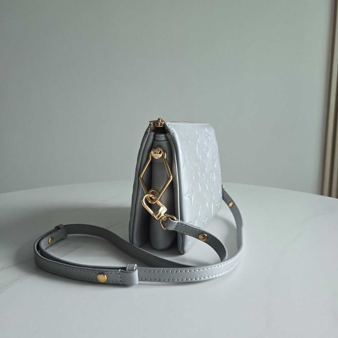 Lv Coussin (Category: Luxury Bags & Wallets) located in Paranaque City. Submitted by dclutterqueen (Listing ID 1453063166, Image 2). Description: Louis Vuitton Monogram Embossed Coussin 💯 Genuine leather in silver gray color 💢 Includes long leather strap, no chain strap (lost) 🇯🇵 Acquired preloved from Japan 👜 Measures approximately 8 x 6.5 inches.