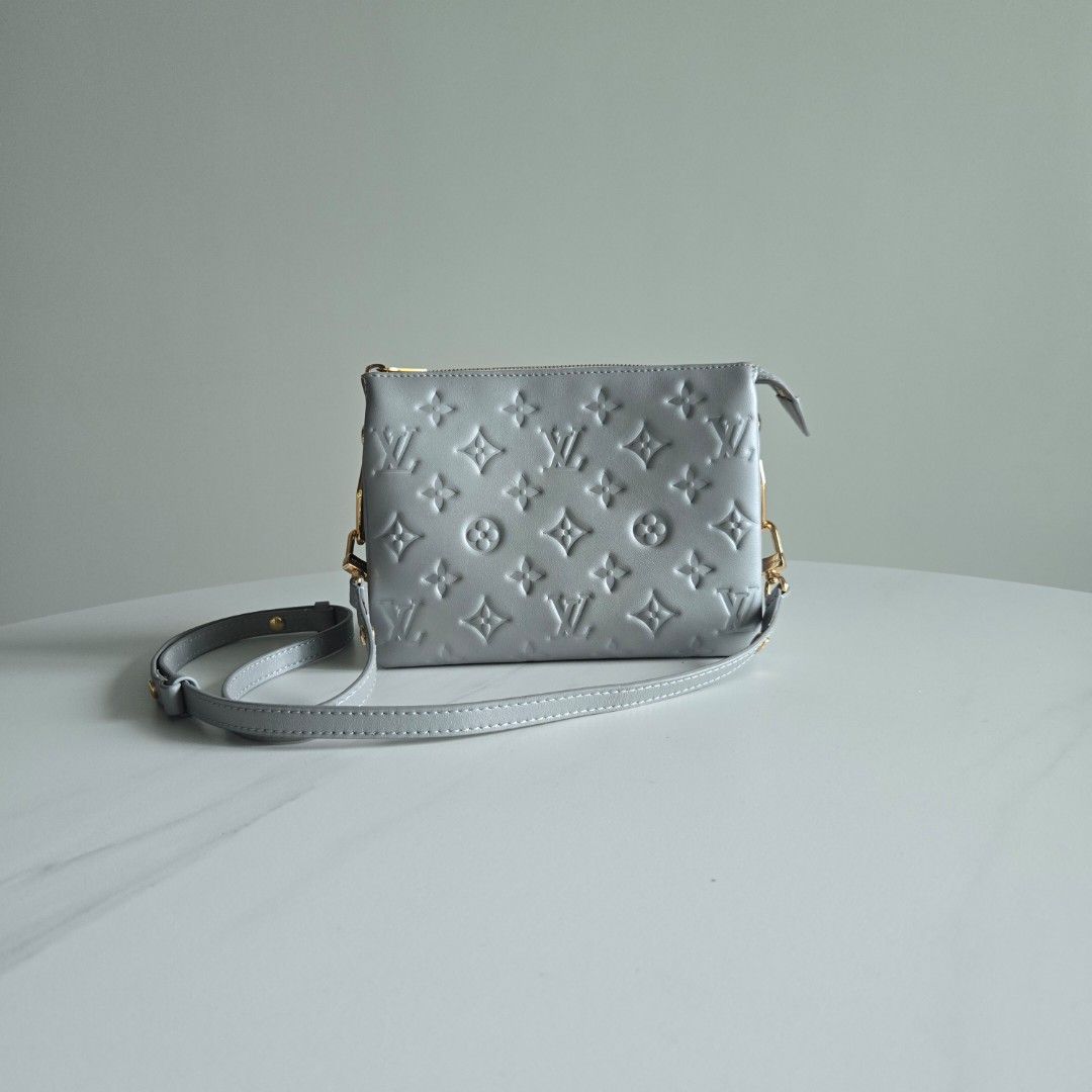 Lv Coussin (Category: Luxury Bags & Wallets) located in Paranaque City. Submitted by dclutterqueen (Listing ID 1453063166, Image 1). Description: Louis Vuitton Monogram Embossed Coussin 💯 Genuine leather in silver gray color 💢 Includes long leather strap, no chain strap (lost) 🇯🇵 Acquired preloved from Japan 👜 Measures approximately 8 x 6.5 inches.