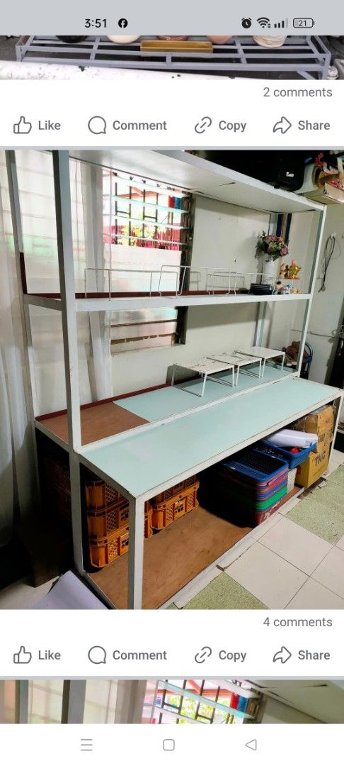 Metal Shelving Unit with Multiple Tiers and Countertop (Category: Shelves, Cabinets & Racks) located in Mandaluyong City. Submitted by rsha31 (Listing ID 1453072926, Image 1). Description: - Sturdy white metal frame - Multiple tiers for ample storage - Wide countertop surface - Light blue/green shelves - Includes storage crates for underneath - Ideal for organization or display - Ready for pickup/ Manila area only.