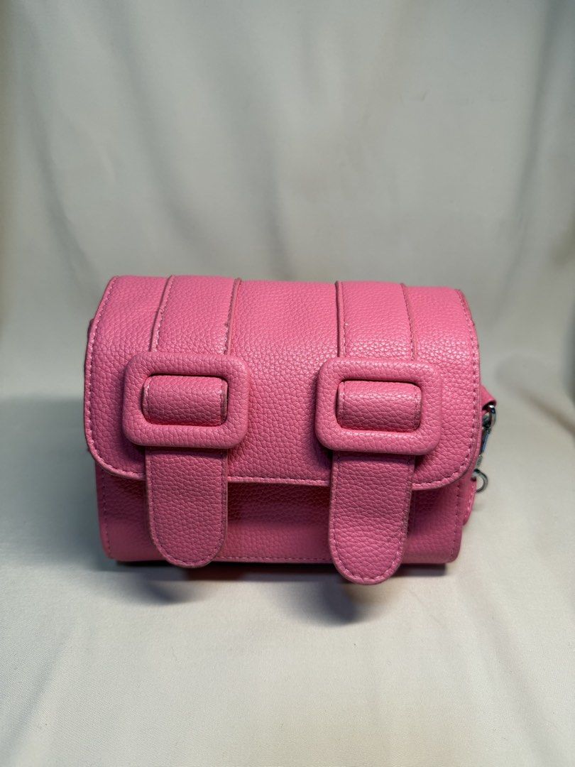Micro Pink crossbody bag (Category: Cross-body Bags) located in Bacoor. Submitted by dormcat (Listing ID 1453130991, Image 2). Description: Pink micro crossbody bag! With some peeling but barely 💖 Cute!!!.