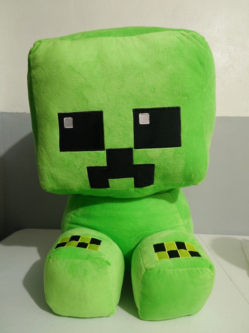 Minecraft Creeper Plush Toy (Category: Plushies & Soft Toys) located in Magalang. Submitted by chuk27 (Listing ID 1453102491, Image 1). Description: Big Minecraft Creeper plush, Approx. 50 cm tall. Super soft, squishy, and clean. Perfect for fans, display, or as a pillow. Height: 50 cm price: 950 All plushies from Timezone Almost new, in very good condition Stored in plastic ever since 🧍 Meetup: Pampanga Area po (SM Clark, SM Pamp, SM Telabastag