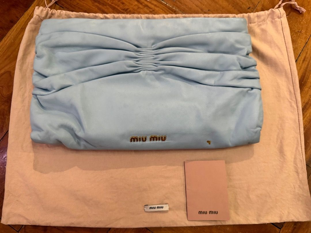 Miu Miu clutch (Category: Luxury Bags & Wallets) located in Quezon City. Submitted by bianxcloset (Listing ID 1453135960, Image 1). Description: Marks from storage .