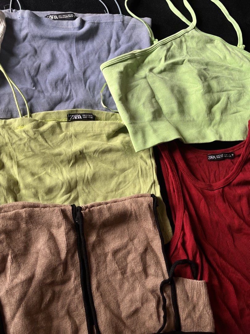 MOVING OUT SALEEEEE Pre-owned Clothes (Category: Blouses) located in Manila. Submitted by jooooaaannnaaa (Listing ID 1453113898, Image 2). Description: - Bundle of Zara and Shein tops - Includes ribbed tanks and long-sleeved styles - Colors: pink, maroon, red, lime green, light blue, beige, white - Mostly size L, some smaller sizes available - Perfect for creating versatile outfits - Sold as a complete set RFS: mga di nagagamit good as new yung i