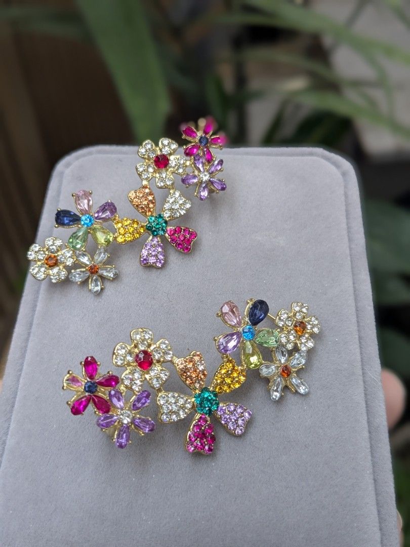 Multi Color Floral Rhinestones Cuff Earrings (Category: Earrings) located in Quezon City. Submitted by nnncorner (Listing ID 1453188970, Image 2). Description: Multi Color Floral Rhinestones Cuff Earrings Clip style on top of wars not so lightweight Hypoallergenic It comes with a box Worn photo is my personal used 790.