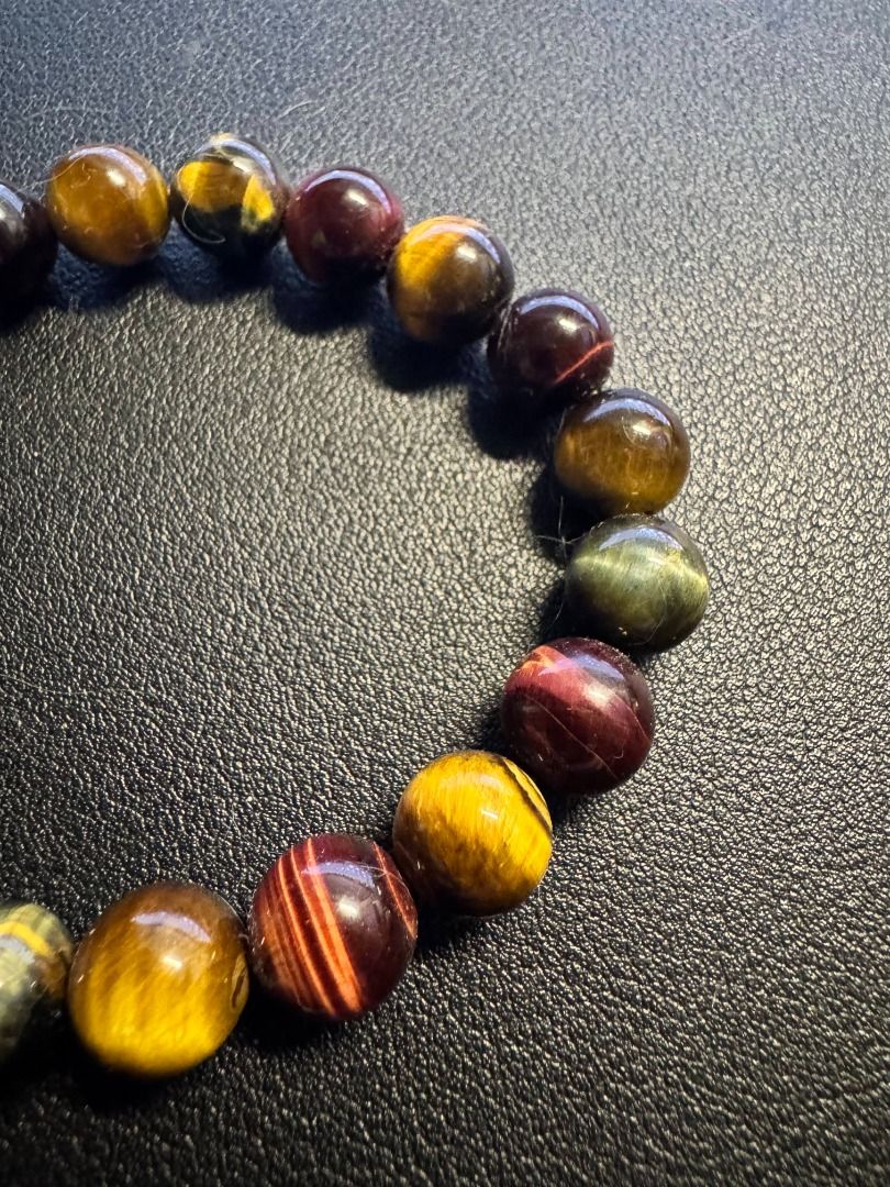 Multicolor Tiger's Eye Bracelet (Category: Bracelets) located in Makati City. Submitted by magsff (Listing ID 1453053767, Image 3). Description: * Bought during a trip to Phuket, Thailand * Combines Gold, Red, Blue Tiger's Eye * Stone of perception, perspective, and self-discipline * Promotes protection and good luck * Enhances confidence and motivation * Promotes calm communication.