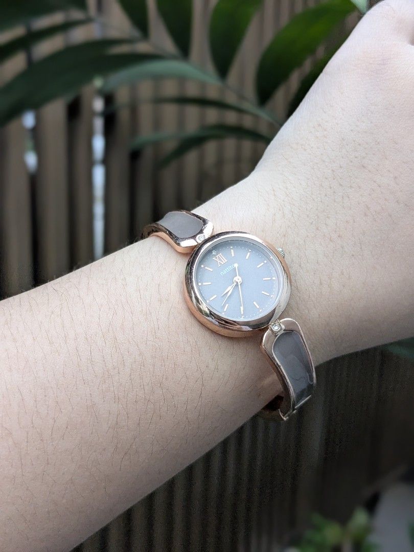 Nattito Mocha Brown Rose Gold Open Bangle Watch (Category: Women's Watches) located in Quezon City. Submitted by nnncorner (Listing ID 1453185482, Image 2). Description: Original Nattito Mocha Brown Rose Gold Open Bangle Watch 100% Original from Japan Good as new No scratches or hairlines on glass face Super pretty pa nito 1 peso coin size dial Fits 15-19cm wrist only It comes with a replacement box only Selling it for 2,300.