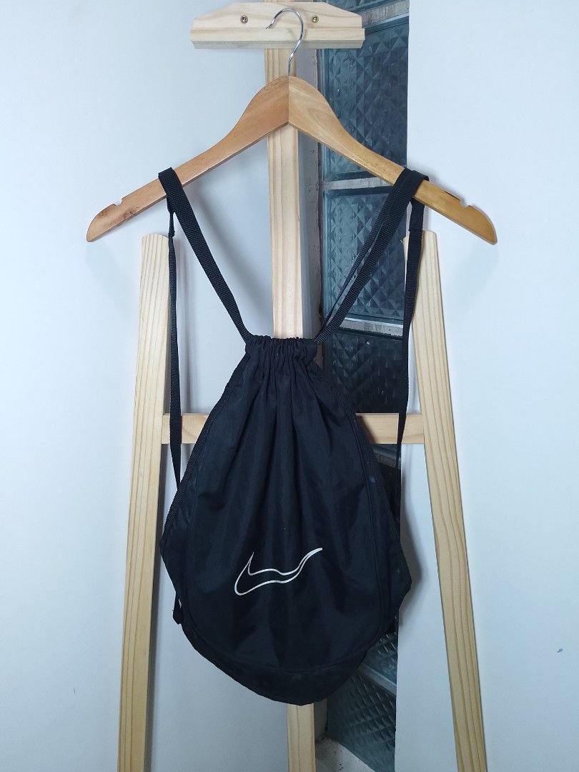 Nike Black Drawstring Bag (Category: Backpacks) located in Manila. Submitted by patrickjos06722 (Listing ID 1453206798, Image 1). Description: - Black Nike drawstring bag - Features iconic Nike swoosh logo - Ideal for gym or everyday use - Comfortable shoulder straps for easy carrying - Made with durable material - Approximate dimensions: 15" W x 20"H - San Miguel Bulacan - Shipping via J&T, buyers expense. - No low balling/last price inquiries -