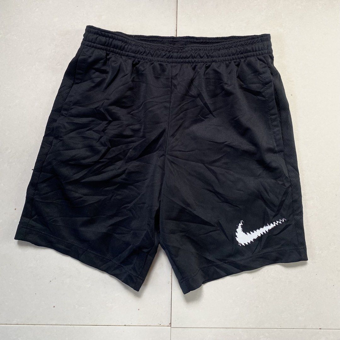 Nike Dri-Fit Black Athletic Shorts (Category: Babies & Kids Fashion) located in Cabadbaran. Submitted by jersey.cobyming (Listing ID 1453088690, Image 1). Description: - Black Nike Dri-Fit Shorts - Size: S - Material: Polyester - Ideal for sports and casual wear - Features comfortable elastic waistband - Iconic Nike swoosh logo Excellent condi Need wash.