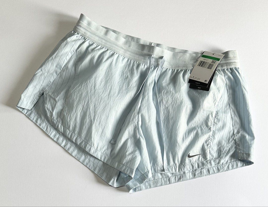 Nike Running Division Mid-Rise Brief Shorts (Category: Activewear) located in Manila. Submitted by reclaimed.shop (Listing ID 1453090807, Image 1). Description: Description: Built for comfort, speed, and everyday performance, these Nike Women’s Running Division Mid-Rise 3” Brief-Lined Running Shorts are designed to move with you through every run. Featuring a lightweight crinkle-woven fabric, supportive inner brief, and reflective details, they d