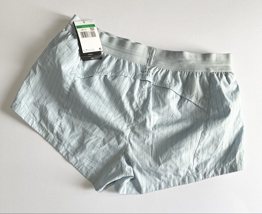 Nike Running Division Mid-Rise Brief Shorts (Category: Activewear) located in Manila. Submitted by reclaimed.shop (Listing ID 1453090807, Image 2). Description: Description: Built for comfort, speed, and everyday performance, these Nike Women’s Running Division Mid-Rise 3” Brief-Lined Running Shorts are designed to move with you through every run. Featuring a lightweight crinkle-woven fabric, supportive inner brief, and reflective details, they d