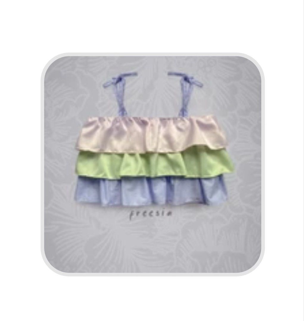 Nin and Yang Flora Top (Freesia) (Category: Blouses) located in Quezon City. Submitted by faithdeclutter (Listing ID 1453145570, Image 2). Description: - Tiered ruffle design - Adjustable tie shoulder straps - Fits small to medium.