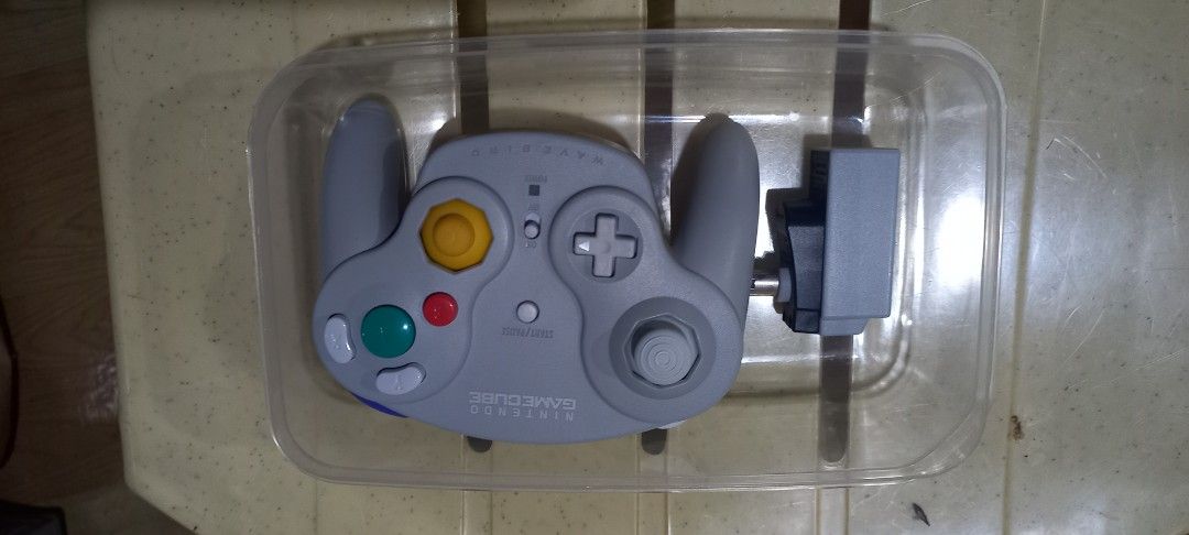 Nintendo GameCube WaveBird Wireless Controller & Receiver (Category: Controllers) located in Impasugong. Submitted by sid_the_adorable (Listing ID 1453050975, Image 2). Description: - Nintendo GameCube WaveBird wireless controller - Includes receiver - Tested and working - Perfect for wireless GameCube gaming.