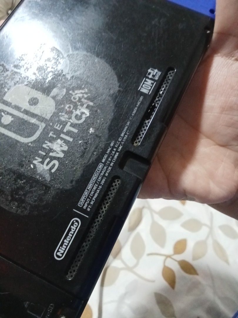 Nintendo Switch Console - Blue & Yellow Joy-Cons (Category: Nintendo) located in Rizal. Submitted by nykeri (Listing ID 1453122725, Image 3). Description: - Nintendo Switch Console - brandnew Blue and Yellow Joy-Cons - Includes clear protective case - Minor scuffing and dust on the back of the console - minor dents, scratches. - Fully functional and works well - with free game card.( sonic forces and bayonetta 2) .
