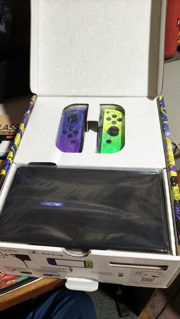 Nintendo Switch OLED Splatoon Edition (Category: Nintendo) located in Manila. Submitted by lauraarseid (Listing ID 1453188037, Image 2). Description: Nintendo Switch OLED Splatoon Edition comes with Tempered Glass and Case "di lang po na include sa pic". New Condition and is in lower firmware version, I mainly bought it for preservation and for my collection so it is only turned on for checking and never used for any gaming. All accessories are a