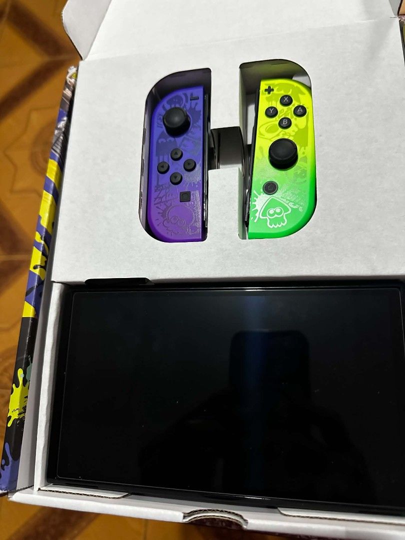 Nintendo Switch Splatoon 3 Edition Console with Games (Category: Nintendo) located in Caloocan City. Submitted by alexander30551 (Listing ID 1453111027, Image 2). Description: - Nintendo Switch Splatoon 3 Edition console - Includes original box and packaging - SpongeBob, Super Mario Odyssey, and Sonic Frontiers - Includes a purple carrying case NO to BUY and SELL.