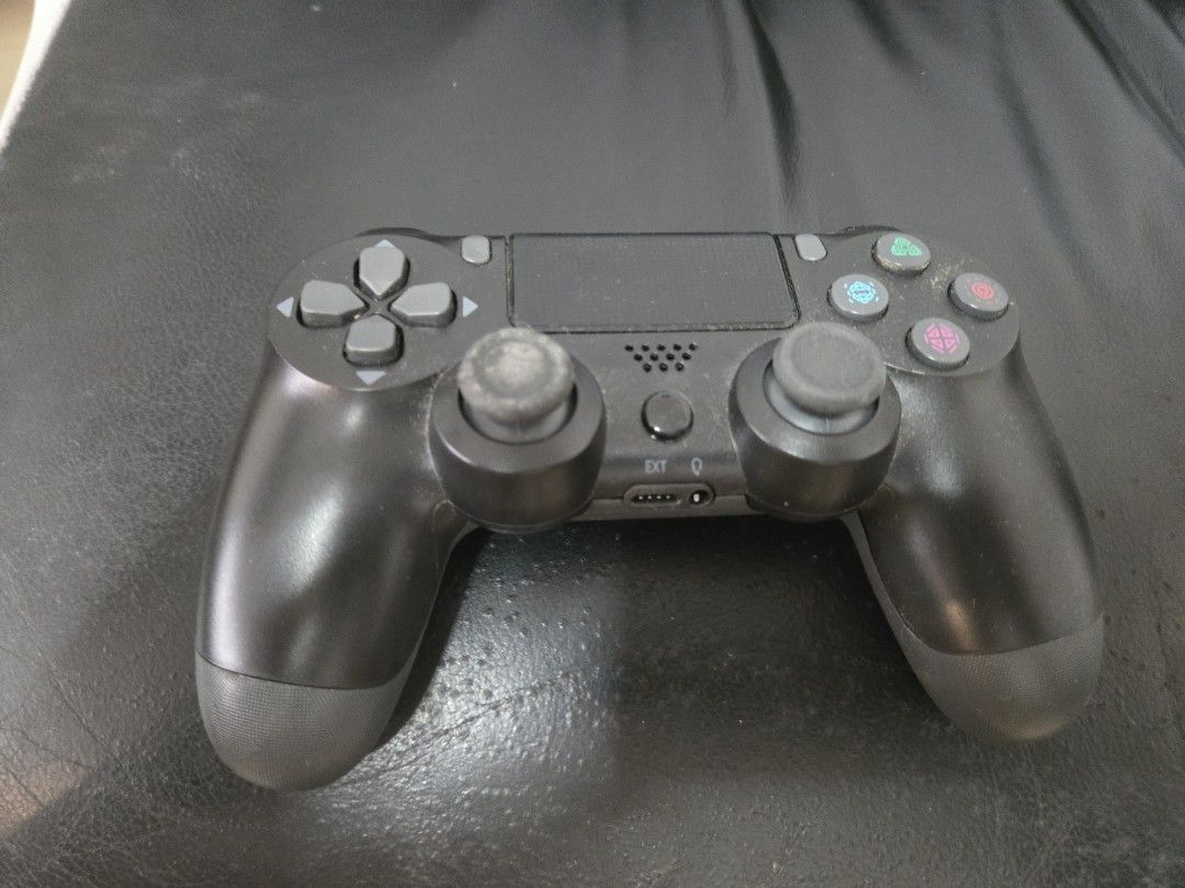 Pc Controller (Category: Controllers) located in Singapore. Submitted by onlyexample99 (Listing ID 1453179602, Image 1). Description: - Pc Controller - Minor wear - All buttons and triggers intact - Light bar visible - EXT port and headphone jack present - Fully functional, can be wired/wireless via Bluetooth .