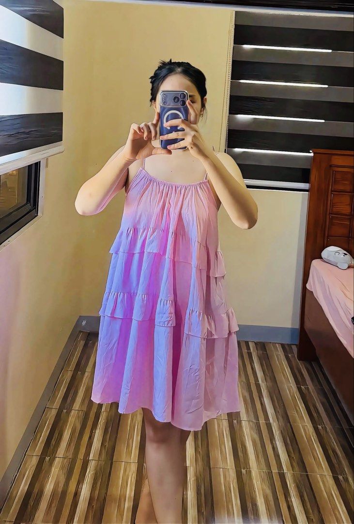 Pink Tiered Spaghetti Strap Mini Dress (Category: Dresses) located in Binmaley. Submitted by cupofcalm (Listing ID 1453127854, Image 1). Description: - Adorable pink mini dress - Features tiered ruffles down the entire dress - Made with light and flowy fabric - Ideal for casual outings or a beach trip - Easy to wear, perfect for warm weather.