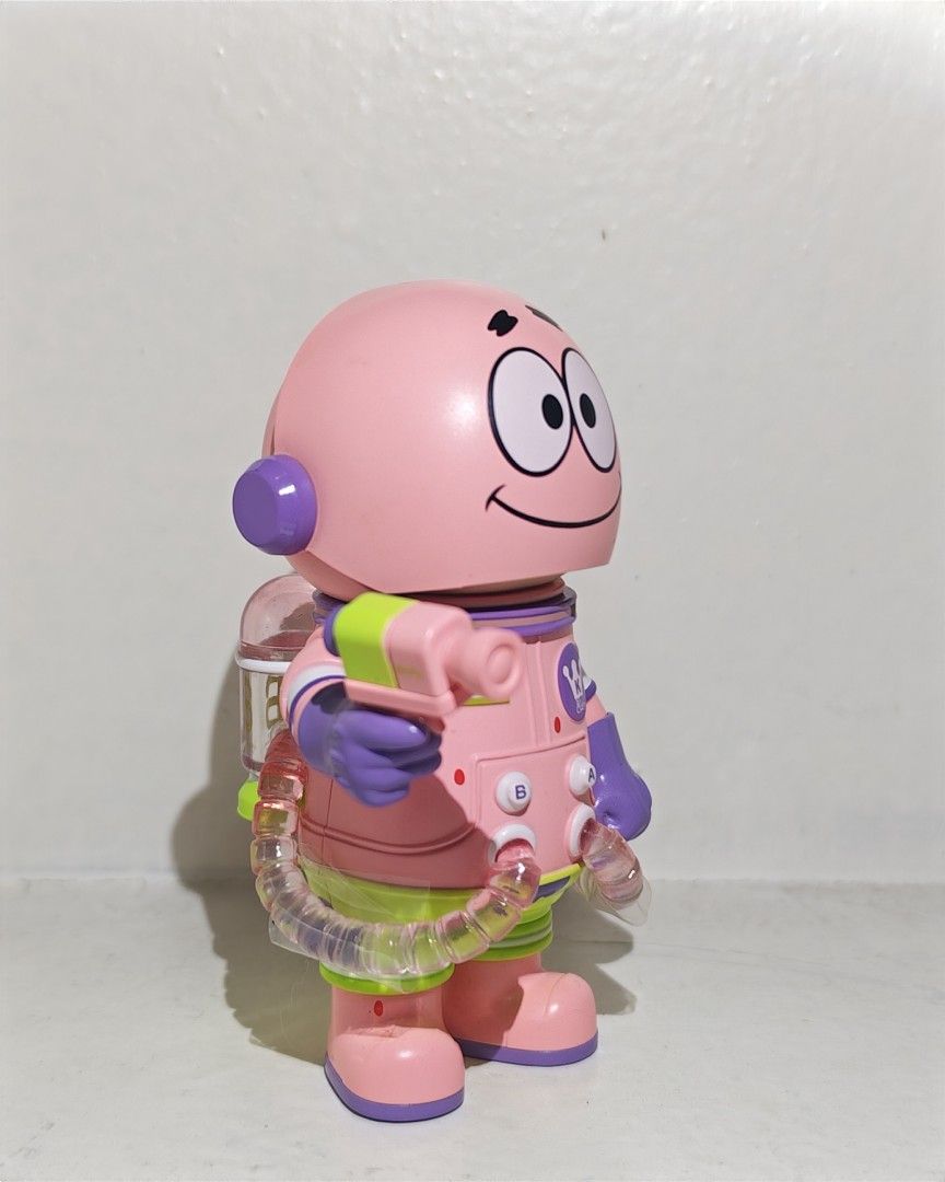 Popmart Space Molly Patrick Star (Category: Designer & Blind Box Toys) located in Quezon City. Submitted by destashingme (Listing ID 1453201233, Image 2). Description: with card- Molly Space Molly figure - Patrick Star design - Pink astronaut outfit with green shorts - Comes with ray gun accessory - Clear tubes on back with 'A' and 'B' labels - Ideal for collectors.