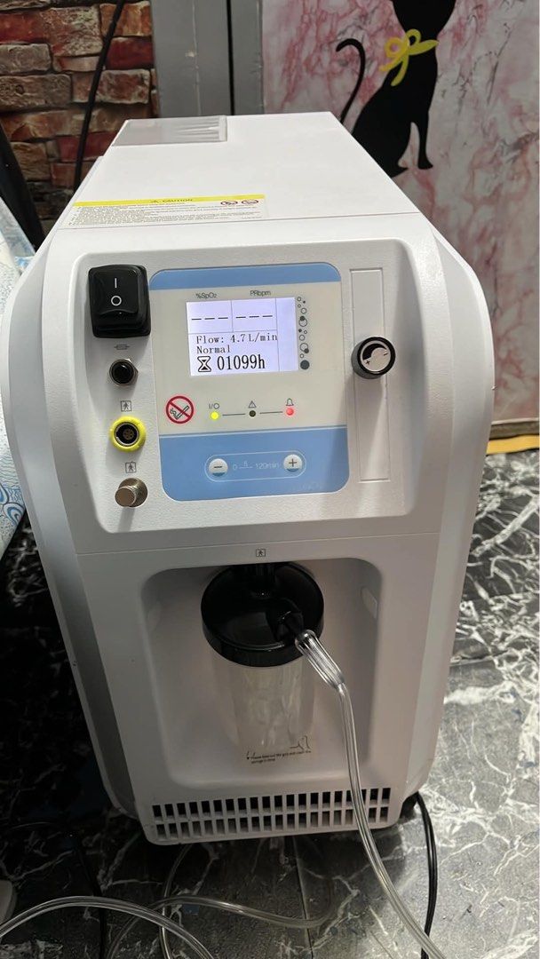 Portable Oxygen Concentrator Machine with nebulizer (Category: Medical Supplies & Tools) located in Quezon City. Submitted by dudsandsky (Listing ID 1453052966, Image 1). Description: - Portable Oxygen Concentrator - Flow Rate: 4.7 L/min - Normal Operation - Timer Function: Up to 120 minutes - Usage Hours: 1099 hours - Includes: Humidifier bottle and tubing - Perfect for Home Use.