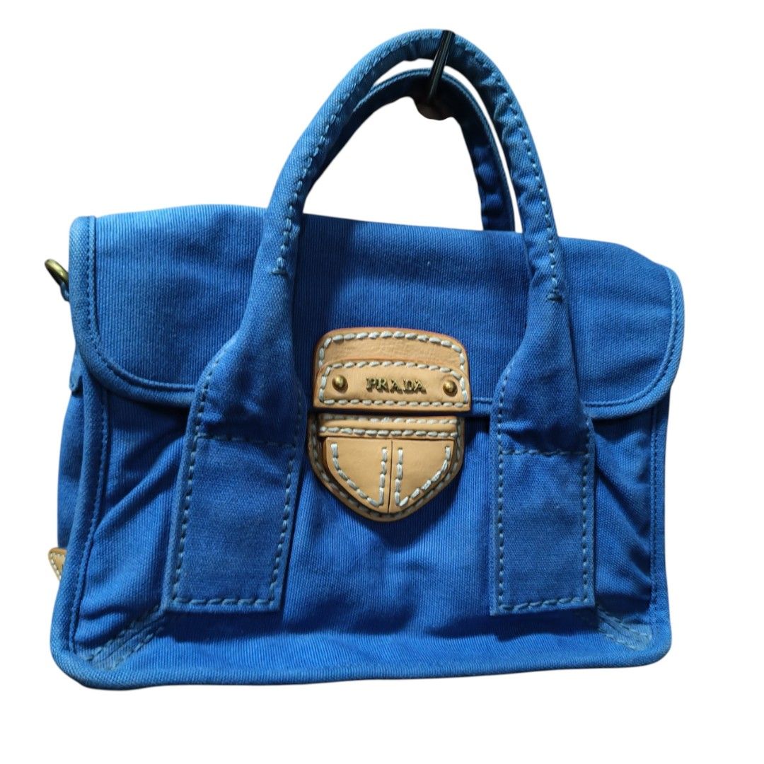 PRADA CANAPA SHOULDER/HAND BAG (Category: Luxury Bags & Wallets) located in Caloocan City. Submitted by allgoodsthrifts (Listing ID 1452814638, Image 1). Description: PRADA CANAPA SHOULDER/HAND BAG -Authentic 💯 (Posted also at Vestiare App) -Missing sling trap -Lampo underzip -Needs wash only -Good Condition Makati City loc..